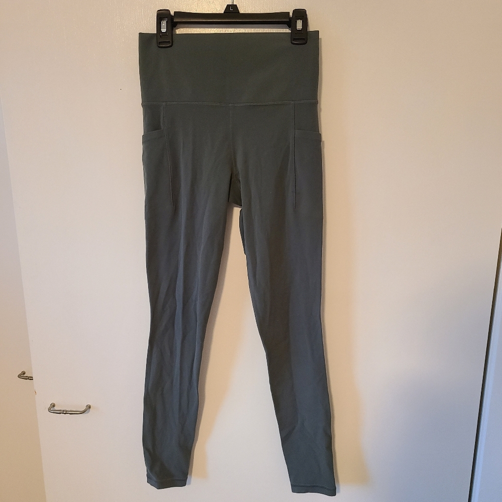 Athleta Salutation Stash Pocket ll Tight Size XS Leggings Dark Green Gray
